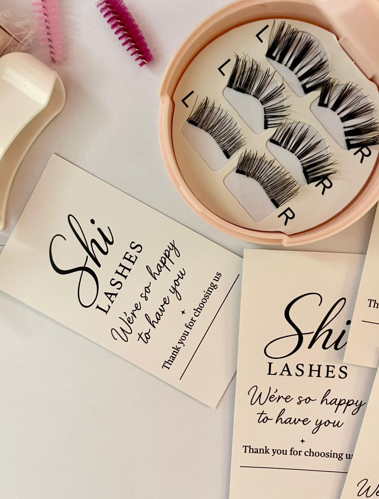 Shi Lashes kit with branded thank you cards, applicator, and spoolie brushes